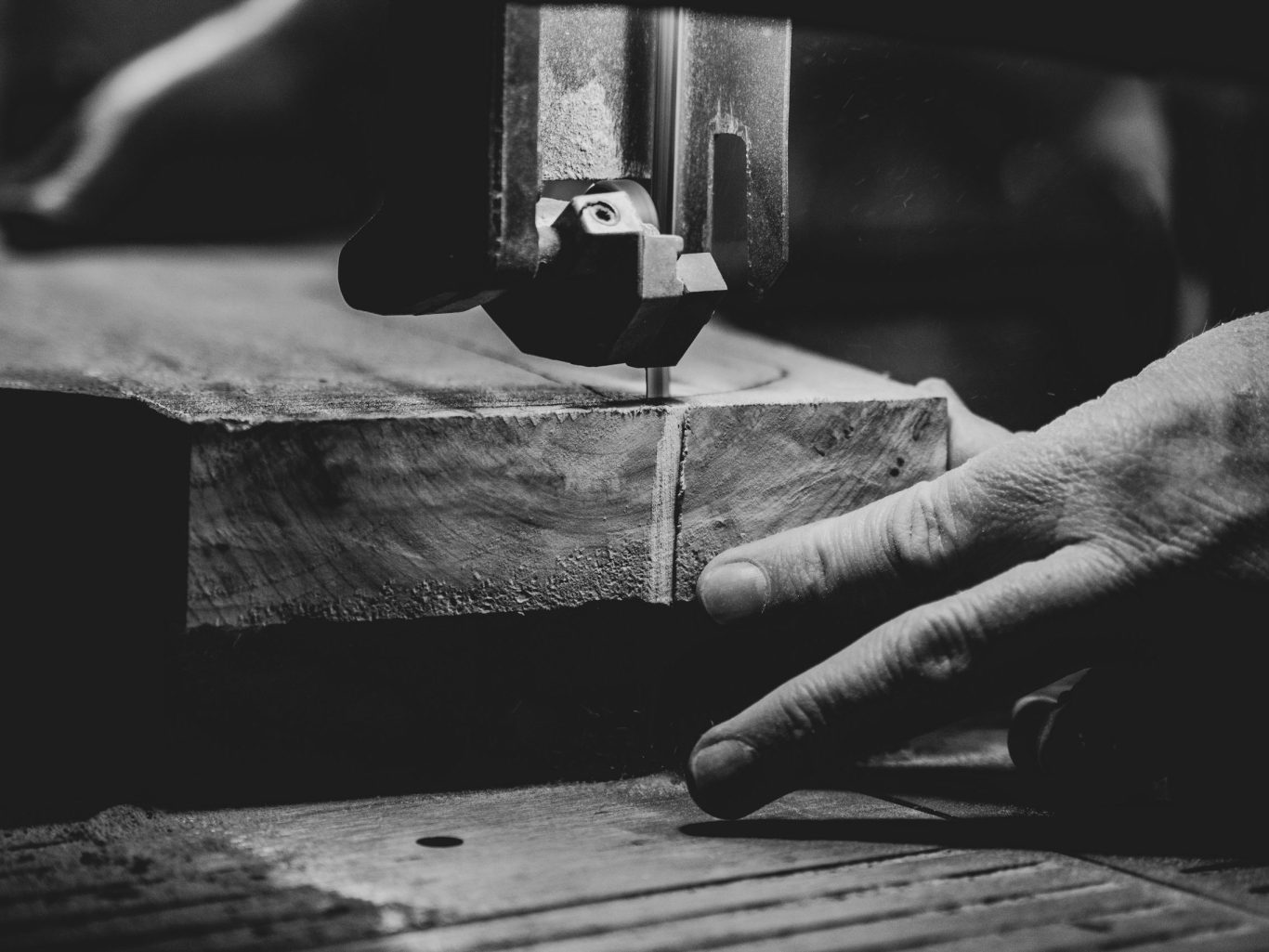 Joinery workshop machine cutting a piece of solid timber